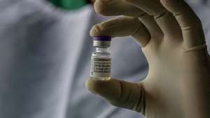 epa09328159 A health worker holds a vial of the Pfizer- BioNTech Comirnaty Covid-19 vaccine at a vaccine center in Colombo, Sri Lanka, 07 July 2021. Following approval by the World Health Organisation for Pfizer- BioNTech and Moderna vaccines to be administered as the second dose for those who have received Astra-Zeneca as the first dose, Sri Lanka is the third South Asian country to receive and begin the vaccination process. The Maldives and Bangladesh are the first and second countries respectively to receive this vaccine through the WHOâ€™s COVAX facility, according to the UNICEF. Sri Lanka is currently using Oxford AstraZeneca, China's Sinopharm, Russian Sputnik V, Covid -19 vaccines for the Vaccine rollout. Meanwhile, Sri Lanka is currently experiencing a serious shortage of Oxford AstraZeneca (Covishield) vaccine, to be given as a second dose.  EPA/CHAMILA KARUNARATHNE