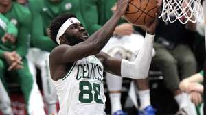 epa11042646 Boston Celtics center Neemias Queta lays up the ball during the second half of the NBA basketball game between the Boston Celtics and Los Angeles Clippers in Los Angeles, California, USA, 23 December 2023.  EPA/ALLISON DINNER  SHUTTERSTOCK OUT