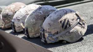 epa09898075 Four army helmet's belonging to a crew of the new Abrams M1A2 Systems Enhanced Package version three tank in Fort Stewart, Georgia, USA, 19 April 2022. The tank rectifies many of the space, weight, and power issues from previous versions of the Abrams tank, and has improved survivability, and integrated counter-improvised explosive device protection.  EPA/STEPHEN B. MORTON