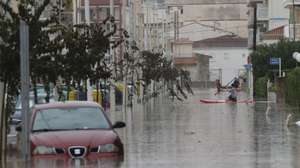 epa13315370 Streets flooded following the passage of Storm Adam in Guardamar de la Safor, Valencia, Spain,19 October 2026. Adam Storm has already claimed two lives and is causing 'extraordinary' rainfall and severe flooding in Valencia and Alicante, with rainfall totals exceeding 600 litres per square metre, rivers bursting their banks and people trapped on rooftops – a situation that has led the Valencian Regional Government to prepare a lockdown order for the affected municipalities.  EPA/Manuel Bruque