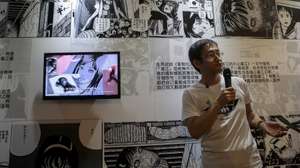epa05052799 Japanese horror manga artist Junji Ito speaks to visitors during the ‘Experience Horror’ exhibition in Taipei, Taiwan, 03 December 2015. The exhibition is Junji Ito’s first personal on his career for nearly 30 years according to the organizer.  EPA/RITCHIE B. TONGO