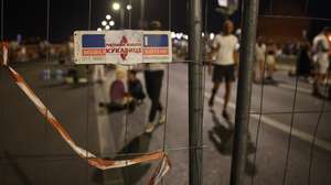 epa12205523 A sticker reading 'Call the elections, Coward' is see on a fence set up by protestors blocking the traffic at the 'Gazela' bridge in Belgrade, Serbia, 29 June 2025. Following a major student protest in Belgrade on 28 June 2025, which ended in clashes with police and several arrests, demonstrations and blockades quickly spread across Serbia as protesters demanded the release of those detained and called for early elections.  EPA/ANDREJ CUKIC