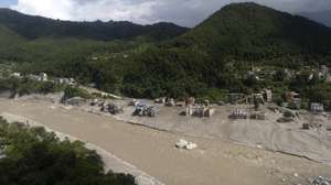 epa13196821 An aerial view shows an area devastated by flash floods and mudslides in Delight village, Nuwakot district, Nepal, 28 August 2026. More than 460 people have died and hundreds remain missing across northern Nepal after a suspected glacial collapse and avalanche triggered flash floods and mudslides along the Bhotekoshi and Trishuli river valleys near the Nepal-Tibet border, causing widespread destruction to settlements and infrastructure, according to local authorities.  EPA/NARENDRA SHRESTHA