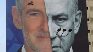 epaselect epa13328190 A bird flies past an election campaign billboard featuring Israeli Prime Minister Benjamin Netanyahu (R) and the leader of The Democrats party, Yair Golan (L), in Tel Aviv, Israel, 24 October 2026. Israel will hold its national legislative election to choose the 120 members of the 26th Knesset on 27 October 2026.  EPA/ABIR SULTAN