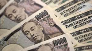 epa05348093 Japanese 10,000 yen and US 10 dollar bank notes are seen in Tokyo, Japan, 06 June 2016. The yen was reaching a month low 106 yen level against the UU dollar in morning trading.  EPA/FRANCK ROBICHON