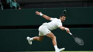 epa13078758 Novak Djokovic of Serbia in action during his Men's Singles second round match against Stefanos Tsitsipas of Greece at the Wimbledon Championships in London, Britain, 01 July 2026.  EPA/NEIL HALL