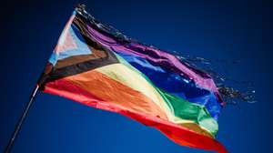 epa10852781 A pride flag waves over the memorial during a commemoration ceremony for the queer victims of the concentration camp Sachsenhausen in Oranienburg near Berlin, Germany, 10 September 2023. In 1942, hundreds of members of the the LGBT community, so-called 'pink triangle' prisoners, of the concentration camp sub-camp 'Klinkerwerk Oranienburg' were murdered in an assassination action. On 10 September 2023, dozens of participants commemorated the victims with speeches, music, and art performances.  EPA/CLEMENS BILAN