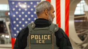 epa12844849 A US Immigration and Customs Enforcement (ICE) agent patrols the John F. Kennedy International Airport, amid congestion caused by the Department of Homeland Security (DHS) shutdown, in the Queens borough of New York, New York, USA, 23 March 2026. ICE agents have begun deploying to major US airports to assist the Transportation Security Administration (TSA) as a partial government shutdown triggers widespread security checkpoint delays. With the Department of Homeland Security (DHS) facing a funding lapse, TSA screeners and thousands of other federal employees are currently working without pay.  EPA/OLGA FEDOROVA