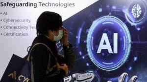epa11338415 A person walks past an AI graphic illustration during the 'CYBERSEC 2024' cyber security expo in Taipei, Taiwan, 14 May 2024. The 10th edition of CYBERSEC 2024, which is held from 14-16 May under the theme 'Generative Future,' gathers leading cybersecurity professionals for more than 300 presentations and features exhibitions from over 500 global brands at Asia’s biggest CYBERSEC EXPO. This year introduces new segments such as the Cyber Taiwan Pavilion, Cyber Talent, and the AIoT and Hardware Security Zone.  EPA/RITCHIE B. TONGO
