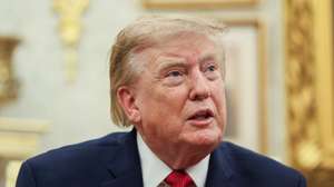 epa13176298 US President Donald J. Trump hosts Lifeguard Ryder Williams in the Oval Office of the White House in Washington, DC, USA, 17 August 2026. Ryder Williams, a 16-year-old lifeguard, saved the life of 10-year-old Nathaniel Rai at Seabright Beach in Santa Cruz, California, on July 25.  EPA/Samuel Corum / POOL
