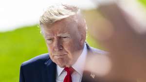 epaselect epa13300711 US President Donald Trump speaks to reporters as he departs the White House for Alaska, in Washington, DC, USA, 13 October 2026. President Trump is traveling to Alaska to campaign for incumbent Republican Senator Dan S. Sullivan, who is running for re-election in November 2026.  EPA/JIM LO SCALZO