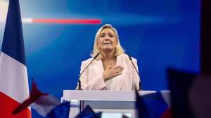 epa13331170 French presidential candidate of the far-right National Rally (RN) party, Marine Le Pen reacts during her presidential campaign launch rally at the Co'Met arena in Orleans, central France, 25 October 2026.  EPA/CHRISTOPHE PETIT TESSON