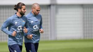 epa09130673 FC Porto's players Sergio Oliveira (L) and Pepe (R) warm up during a trainning session at Olival Trainning Academy in Vila Nova de Gaia,  Portugal, 12 April 2021. FC Porto will face Chelsea in their UEFA Champions League quarterfinal, second leg soccer match at Ramon Sanchez Pizjuan stadium in Seville, Andalusia, Spain, on 13 April 2021.  EPA/FERNANDO VELUDO