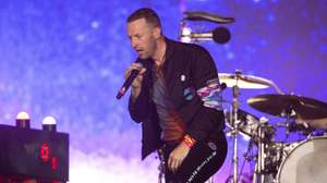 epa09843441 British singer Chris Martin and his band Coldplay perform during a concert as part of the 'Music of the Spheres' tour, at the Felix Sanchez Olympic Stadium in Santo Domingo, Dominican Republic, 22 March 2022.  EPA/Orlando Barria