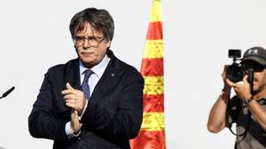 epa11535548 Former Catalan president Carles Puigdemont (L) reacts as he addresses supporters in Barcelona, Spain, 08 August 2024. Catalonia&#039;s former president Carles Puigdemont returned to Spain after seven years of self-imposed exile abroad, despite a pending arrest warrant. The Mossos d&#039;Esquadra was deployed early morning on 08 August to secure access to the Parliament for the investiture of Salvador Illa. The plenary session of the Parliament will host the investiture debate of the Socialist leader Salvador Illa as the new president of the Generalitat, the government of Catalonia.  EPA/ALBERTO ESTEVEZ