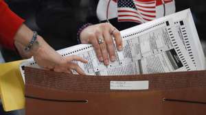 epaselect epa10297192 An election worker prepares ballots to be processed at the Clark County Election Department in North Las Vegas, Nevada, USA, 09 November 2022. The US midterm elections are held every four years at the midpoint of each presidential term and this year include elections for all 435 seats in the House of Representatives, 35 of the 100 seats in the Senate and 36 of the 50 state governors as well as numerous other local seats and ballot issues.  EPA/CAROLINE BREHMAN