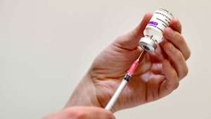 epa09085987 A doctor vaccinates a client with AstraZeneca's Covid-19 vaccine in Ede, the Netherlands, 20 March 2021. EU member countries reintroduced the AstraZeneca Covid-19 vaccine in their inoculation campaigns following the European Medicines Agency (EMA) announcement of 18 March to uphold its approval of the vaccine. Some countries stopped giving the vaccine over fears there might be links between the vaccination against Covid-19 with the AstraZeneca vaccine and a rare number of blood clots.  EPA/Piroschka van de Wouw