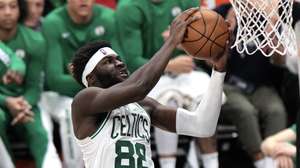 epa11042646 Boston Celtics center Neemias Queta lays up the ball during the second half of the NBA basketball game between the Boston Celtics and Los Angeles Clippers in Los Angeles, California, USA, 23 December 2023.  EPA/ALLISON DINNER  SHUTTERSTOCK OUT