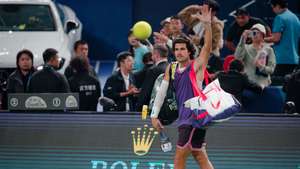 epa13298660 Carlos Alcaraz of Spain reacts after losing his men's singles match against Zizou Bergs of Belgium at the Shanghai Masters tennis tournament in Shanghai, China, 12 October 2026.  EPA/ALEX PLAVEVSKI