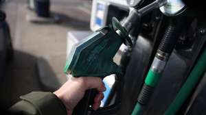 epa12809302 A person handles a fuel pump  at a petrol forecourt in London, Britain, 10 March 2026. Global oil prices have risen sharply after Iran's response to US and Israeli airstrikes disrupted shipping. UK Chancellor Rachel Reeves has said Britain is likely to be hit by rising inflation because of the US-Iran war. In response to concerns that some petrol stations are exploiting the conflict to unjustifiably raise fuel costs, Chancellor Rachel Reeves has issued a stern warning against 'price gouging' by retailers.  EPA/NEIL HALL