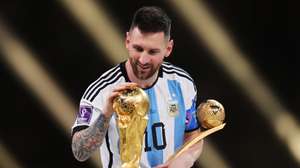 epa13202782 (FILE) - Lionel Messi of Argentina touches the World Cup trophy as he passes it after winning the golden ball award during the awards ceremony after the FIFA World Cup 2022 Final between Argentina and France at Lusail stadium, Lusail, Qatar, 18 December 2022 (Reissued 31 August 2026). Lionel Messi announed his retirement from international soccer on 31 August 2026.  EPA/FRIEDEMANN VOGEL