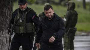 epa09956431 A picture taken during a visit to Mariupol organised by the Russian military shows Head of the self-proclaimed Donetsk People's Republic Denis Pushilin walks on a street in Mariupol, Ukraine, 18 May 2022. On 24 February, Russian troops invaded Ukrainian territory starting a conflict that has provoked destruction and a humanitarian crisis. According to the UNHCR, more than six million refugees have fled Ukraine, and a further 7.7 million people have been displaced internally within Ukraine since.  EPA/SERGEI ILNITSKY