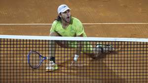 epa13131175 Jaime Faria of Portugal in action against Luciano Darderi of Italy during the quarter-final match of the Estoril Open tennis tournament, in Estoril, outskirts of Lisbon, Portugal, 24 July 2026.  EPA/JOSE SENA GOULAO
