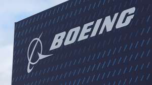 epa11491586 The Boeing logo is pictured on the opening day of the Farnborough International Airshow in Farnborough, Britain, 22 July 2024. The aviation summit is typically a platform for planemakers to rack up multibillion-dollar deals. The airshow runs from 22 to 26 July.  EPA/NEIL HALL