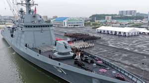 epa12434037 A photo released by the official North Korean Central News Agency (KCNA) shows North Korean leader Kim Jong Un presiding over a ceremony during a visit to the 'Choe Hyon' naval detroyer of the Navy of the Korean People's Army, as part of the Defence Development-2025 military hardware exhibition, at an undisclosed location in North Korea, 05 October 2025 (issued 06 October 2025).  EPA/KCNA  EDITORIAL USE ONLY