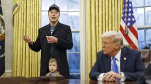 epaselect epa11889366 US entrepreneur and U.S. special government employee Elon Musk (L), with his son X, and US President Donald J. Trump (R) talk to media in the Oval Office of the White House in Washington, DC, USA, 11 February 2025.  EPA/Aaron Schwartz / POOL