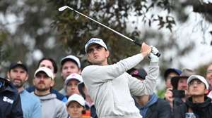 epa12573506 Daniel Rodrigues of Portugal tee’s off on the 5th hole during round three of the Australian Open Golf tournament at the Royal Melbourne Golf Club in Melbourne, Australia, 06 December 2025.  EPA/JAMES ROSS NO ARCHIVING, EDITORIAL USE ONLY AUSTRALIA AND NEW ZEALAND OUT