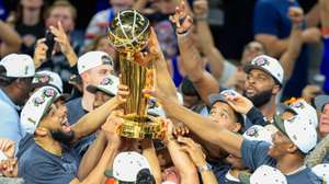 epaselect epaselect epa13035764 New York Knicks players hold up the Larry O'Brien Championship Trophy after winning Game 5 of the NBA Finals between the San Antonio Spurs and the New York Knicks, San Antonio, USA, 13 June 2026.  EPA/ADAM DAVIS  SHUTTERSTOCK OUT