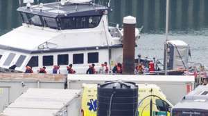 epa12242770 A group of people believed to be migrants is brought to Dover Marina from a UK Border Force vessel following small boat incidents in the English Channel in Dover, Kent, Britain, 17 July 2025. The British and French governments recently agreed to a deal that allows undocumented migrants arriving in the UK via small boats to be returned to France under a ‘one in, one out’ scheme intended to reduce migrant crossings of the Channel.  EPA/TOLGA AKMEN