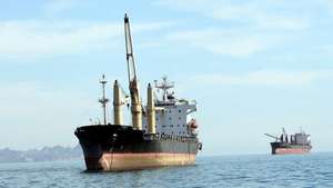 epa12835635 (FILE) - Cargo ships are seen in the Persian Gulf near Qeshm Island in Hormozgan province, Iran, 23 December 2011 (reissued 20 March 2026). 70% of the maritime shipping in the Strait of Hormuz has declined since tensions in the Persian Gulf Region increased on 28 February 2026. According to the International Food Policy Research Institute IFPRI, a prolonged closure of the Strait of Hormuz could affect fertilizers and food production costs, with 30% of global fertilizer passing through the Strait.  EPA/ABEDIN TAHERKENAREH *** Local Caption *** 50153297