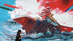 epaselect epa12931847 An Iranian walks next to an anti-US mural in a street in Tehran, Iran, 04 May 2026. Iranian Foreign Ministry Spokesman Esmaeil Baghaei criticized the US president's plans on the passage of vessels through the Strait of Hormuz, a day after Donald Trump said that Washington would begin escorting ships through the waterway.  EPA/ABEDIN TAHERKENAREH