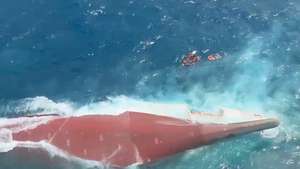 epa13236471 A handout photo made available by Indonesia's National Search and Rescue Agency (Basarnas) shows the capsized passenger ferry KM Virgo Transport 8 in the Java Sea off the coast of Banjarmasin, South Kalimantan, Indonesia, 13 September 2026. The vessel, carrying 243 passengers and crew members en route from Surabaya to Banjarmasin, encountered bad weather and heavy seas before capsizing. Search and rescue operations remain underway after search teams and passing ships rescued over 100 survivors and six bodies.  EPA/BASARNAS HANDOUT -- BEST QUALITY AVAILABLE -- HANDOUT EDITORIAL USE ONLY/NO SALES
