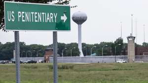 epa08874861 (FILE) - A sign points to the Federal Correctional Complex, where the federal execution chamber is located, in Terre Haute, Indiana, USA, 15 July 2020 (reissued 10 December 2020). The US Department of Justice has ordered two executions of inmates on death row for 10 and 11 December. Brandon Bernard is supposed to be killed with lethal injection on death row in Terre Haute, Indiana, followed by 56-year-old Alfred Bourgeois the following day. Another three state exeuctions are planned just a few days before President-elect Joe Biden takes office on 20 January.  EPA/TANNEN MAURY