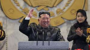 epaselect epa12777445 A photo released by the official North Korean Central News Agency (KCNA) shows North Korean leader Kim Jong Un (L) gesturing while his daughter Kim Ju Ae (R) looks on during a military parade to celebrate the ninth congress of the ruling Workers' Party at Kim Il Sung Square in Pyongyang, North Korea, 25 February 2026 (issued 26 February 2026). The event marked the conclusion of the week-long Ninth Congress of the Workers' Party of Korea (WPK) in Pyongyang.  EPA/KCNA  EDITORIAL USE ONLY