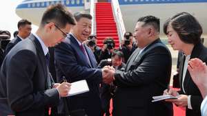 epa13027452 A photo released by the official North Korean Central News Agency (KCNA) shows Chinese President Xi Jinping (2-L) shaking hands with North Korea leader Kim Jong Un (2-R) at the international airport before his departure in Pyongyang, North Korea, 09 June 2026 (issued 10 June 2026). Xi returned to Beijing on 09 June after concluding his two-day state visit to North Korea.  EPA/KCNA  EDITORIAL USE ONLY