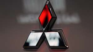 epa11326270 The Mitsubishi Motors logo is seen on a vehicle displayed at a carmaker showroom in Tokyo, Japan, 08 May 2024. Mitsubishi Motors Corporation announced its full-year financial results for FY2023, showing that its consolidated net sales for the full fiscal year rose 13 percent year on year.  EPA/FRANCK ROBICHON