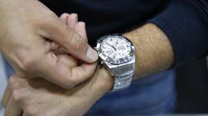 epa10545429 A man adjusts the time on his watch in Beirut, Lebanon, 27 March 2023. The decision to delay the commencement of daylight savings time from the customary last Sunday in March to at the end of Ramadan on 21 April was announced by the government of Lebanon on 23 March. On 26 March, the move sparked widespread confusion as it was opposed by several Christian institutions, including the largest church in the country, the Maronite church. Lebanese caretaker Prime Minister Najib Mikati said the Council of Ministers voted during its meeting on 27 March to move the clock forward one hour on Wednesday night 29 March.  EPA/WAEL HAMZEH