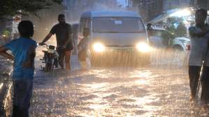 epa11571730 People make their way through a water logged road after heavy downpour in Hyderabad, Pakistan, 29 August 2024. The Met Department of Pakistan has forecasted widespread rainfall and potential flooding across multiple regions, with heavy downpours expected in Bannu, Lakki Marwat, Dera Ismail Khan, and several cities in Sindh and Punjab, including Bahawalpur and Karachi. The Provincial Disaster Management Authority (PDMA) has issued an alert for Punjab, warning of urban and flash flooding, and advising deputy commissioners to stay prepared for emergencies. The monsoon spell is anticipated to last until 31 August, with recent reports indicating normal water flow in rivers, though concerns about flood risks in Dera Ghazi Khan and Rajanpur persist.  EPA/NADEEM KHAWER