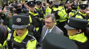 epaselect epa11297500 Former Democratic Unionist Party (DUP) leader Sir Jeffrey Donaldson (C) leaves Newry Magistrates Court in Newry, Northern Ireland, Britain, 24 April 2024. Sir Jeffrey Donaldson faces alleged historical sex charges. Donaldson resigned as leader of the DUP after being charged and was suspended from the party pending judicial resolution.  EPA/MARK MARLOW