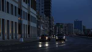 epa13153026 Cars drive down a street near the Malecón in Havana, Cuba, 05 August 2026. Cuba experienced another day with virtually no power across the entire country, with blackouts that will leave up to 70 percent of the island without power at any given time during peak energy demand, according to data from the state-owned company Unión Eléctrica (UNE).  EPA/Ernesto Mastrascusa