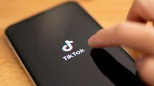 epa08578274 (FILE) - A close-up shows the video-sharing application &#039;TikTok&#039; on a smart phone in Berlin, Germany, 07 July 2020 (reissued 01 August 2020). US President Trump said he intends to ban Chinese social media app TikTok.  EPA/HAYOUNG JEON