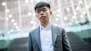 epa08692656 (FILE) - Hong Kong Demosisto party Secretary General and pro-democracy activist Joshua Wong poses for media after a press conference at the Federal Press Conference (Bundespressekonferenz) in Berlin, Germany, 11 September 2019 (reissued 24 September 2020). According to media reports, Wong was arrented on 24 September 2020 while reporting to Central Police Station in Hong Kong, on charges of participating in an unlawful assembly on 05 October 2019, as well as violating the anti-mask law.  EPA/CLEMENS BILAN