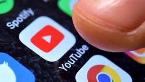 epa08934619 (FILE) - A close-up image shows the YouTube app on an iPhone in Kaarst, Germany, 08 November 2017 (reissued 13 January 2021). YouTube announced on 12 January 2021 that it temporarily suspended US President Donald J. Trump's account for a minimum of seven days citing concerns about the potential of violence following riots at the US Capitol in Washington, DC, USA last week. The Google-owned video-sharing service follows other social media and online services limiting the president's online activities. The suspension temporarily prevents Trump's channel from uploading new videos or live-streaming material, even though the channel continues to be live.  EPA/SASCHA STEINBACH *** Local Caption *** 53883779
