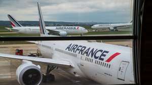 epa09130174 An Air France Boeing 787 bound for Bogota, Colombia,  awaiting loading  of Chinese vaccine SinoVac in Roissy Airport, near Paris, 11 April 2021 (issued 12 April 2021). Airline company Air France KLM Cargo, operated two flies to Cameroon and Colombia with a shipment of Chinese covid19 vaccines SinoPharm and SinoVac through its cargo area of Roissy airport (CDG).  EPA/CHRISTOPHE PETIT TESSON