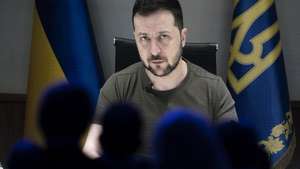 epa09968631 Ukrainian President Volodymyr Zelensky delivers an address via videolink during the opening plenary session of the 51st annual meeting of the World Economic Forum (WEF) in Davos, Switzerland, 23 May 2022. The forum has been postponed due to the COVID-19 pandemic and was rescheduled to early summer. The meeting brings together entrepreneurs, scientists, corporate and political leaders in Davos under the topic 'History at a Turning Point: Government Policies and Business Strategies' from 22 to 26 May 2022.  EPA/GIAN EHRENZELLER