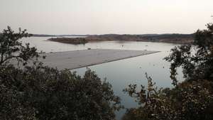 General view of the Solar Floating plant on the Alqueva dam wall at the River Guadiana, in Portel, eastern of Portugal, 15 July 2022. The Floating Solar Power Plant of Alqueva, "the largest floating solar park" in a dam reservoir in Europe, an investment of six million euros, was inaugurated today by the Prime Minister, Antonio Costa. NUNO VEIGA/LUSA